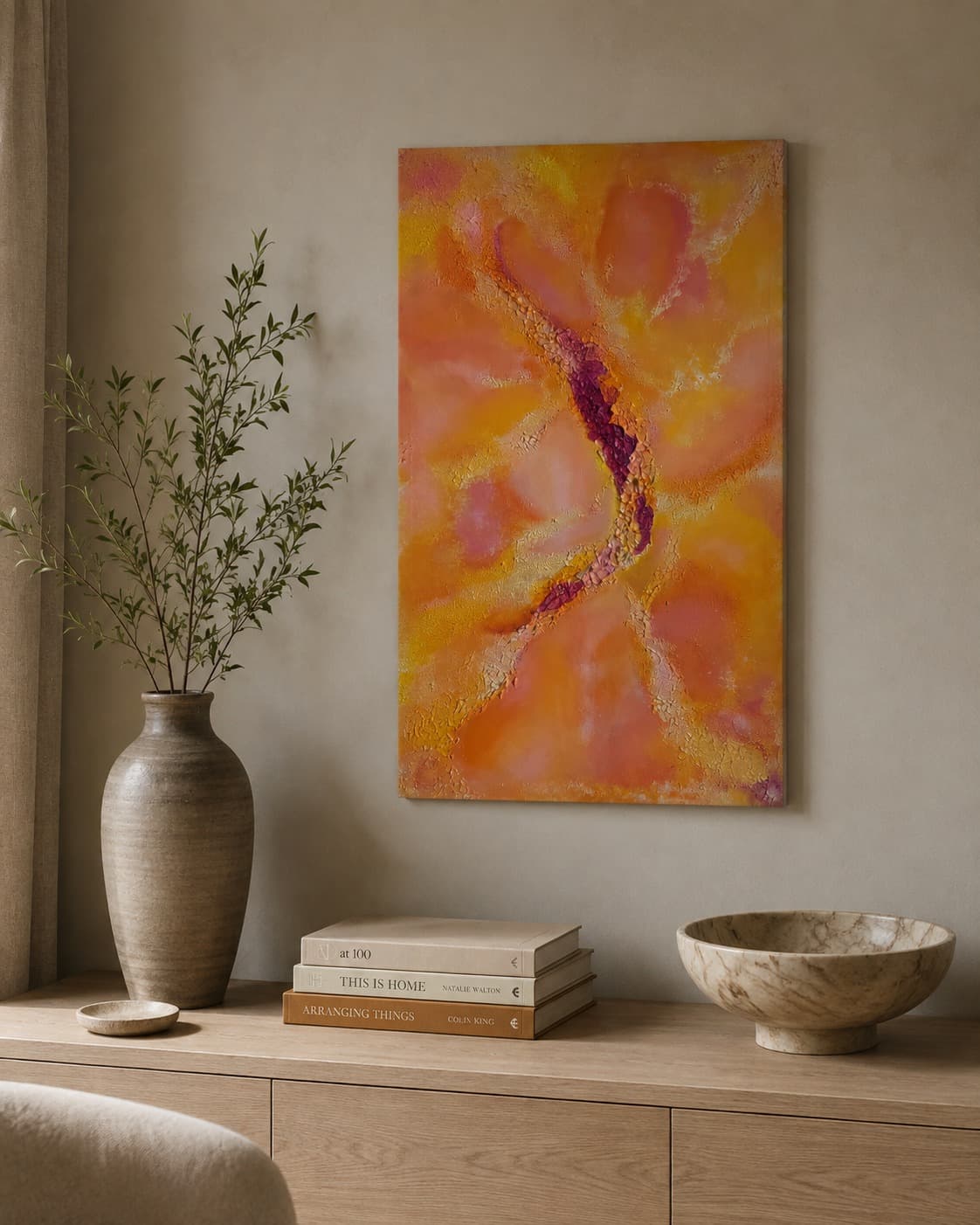 Shafaq: saffron and coral canvas with a seam of magenta and gold, hung above a console